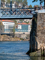 A teenager Jumping into the Douro River, Porto, Portugal, September 2018
